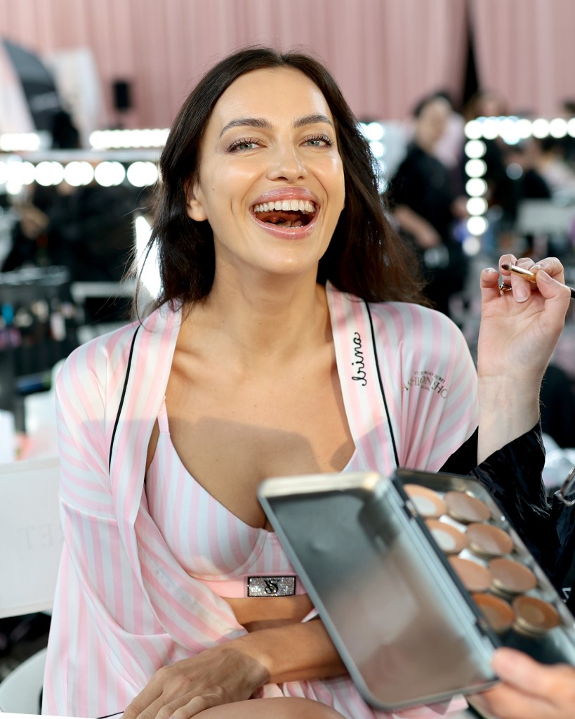 Irina Shayk gets glammed up backstage before the Victoria's Secret Fashion Show