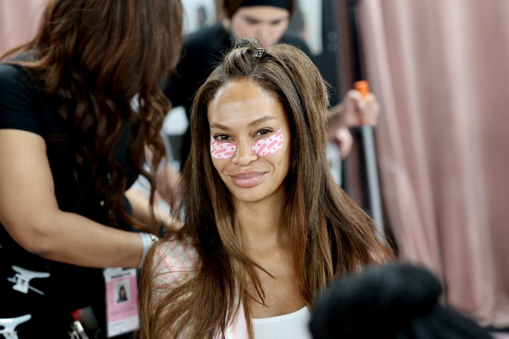 Joan Smalls gets glammed up backstage before the Victoria's Secret Fashion Show