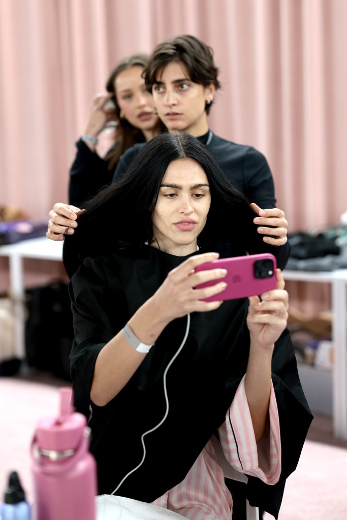Amelia Gray gets glammed up backstage before the Victoria's Secret Fashion Show