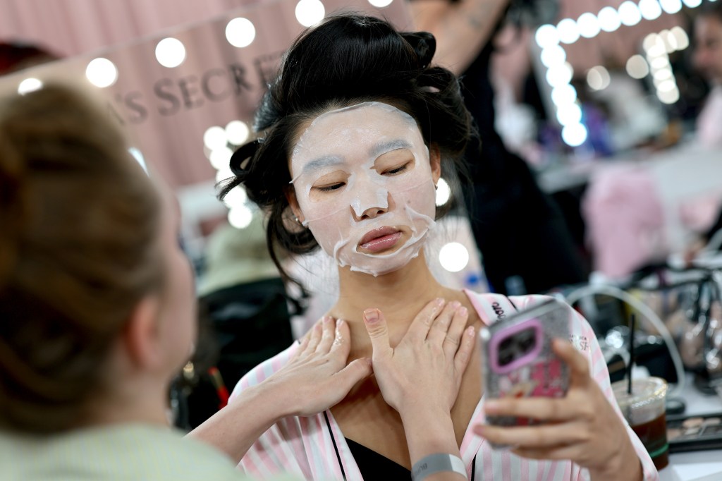 Yoon Young Bae gets glammed up backstage before the Victoria's Secret Fashion Show