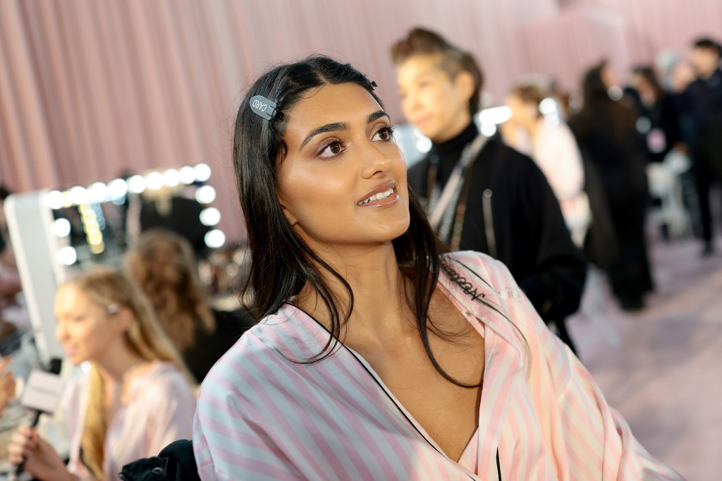 Neelam Gill gets glammed up backstage before the Victoria's Secret Fashion Show