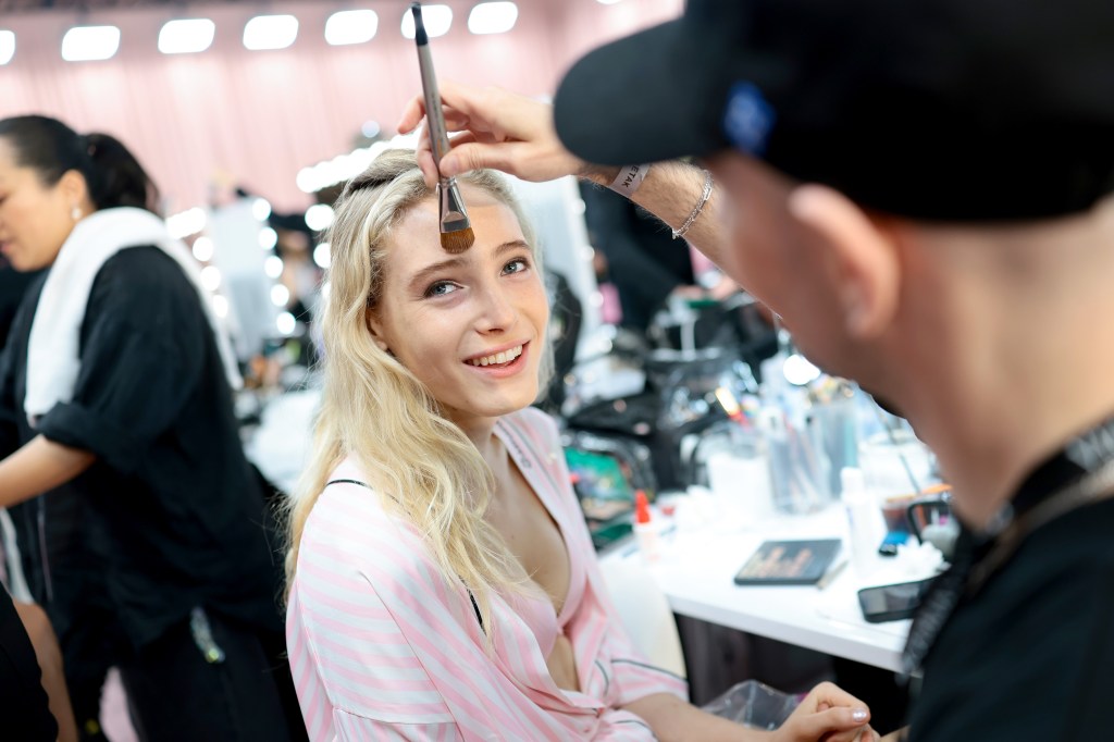 Summer Drix gets glammed up backstage before the Victoria's Secret Fashion Show