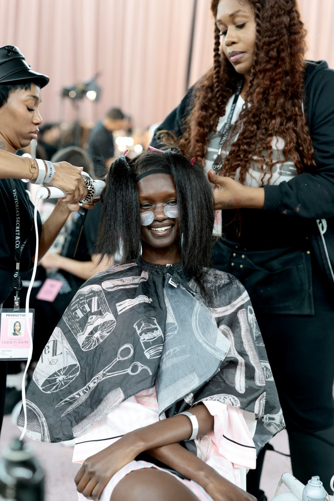 Abény Nhial gets glammed up backstage before the Victoria's Secret Fashion Show