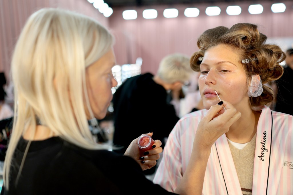 Angelina Kendall gets glammed up backstage before the Victoria's Secret Fashion Show
