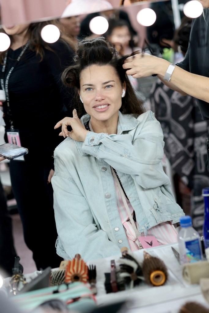 Adriana Lima gets glammed up backstage before the Victoria's Secret Fashion Show