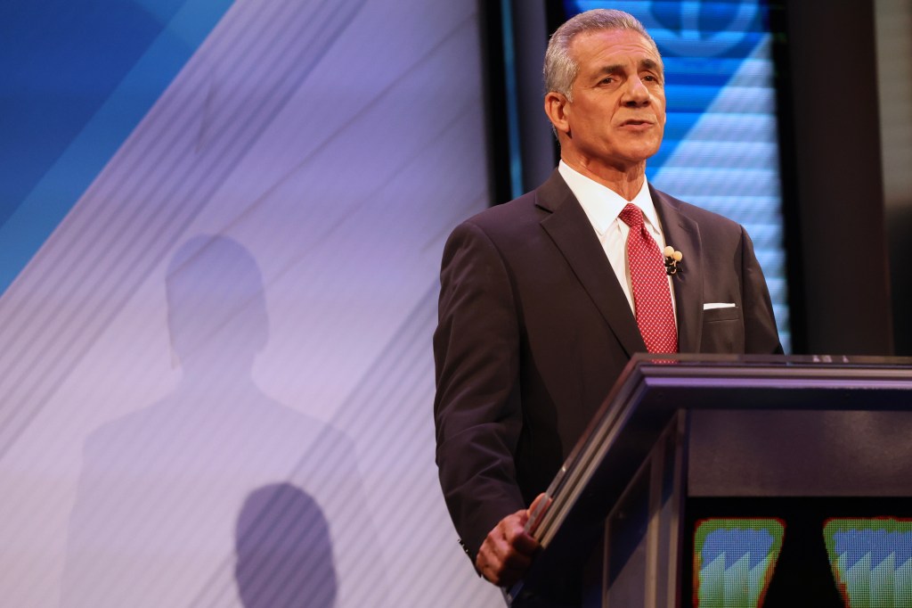 Republican Jack Ciattarelli speaking at a podium during a debate.