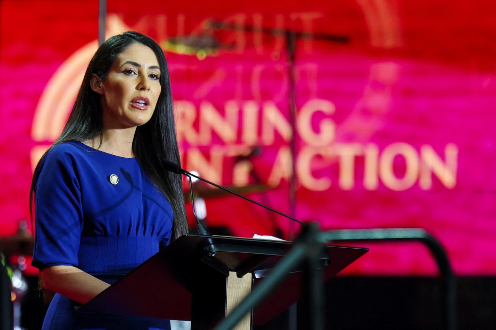 U.S. Representative Anna Paulina Luna speaking at a memorial service.