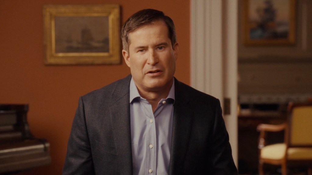 Rep. Seth Moulton in a blue shirt and dark suit jacket.