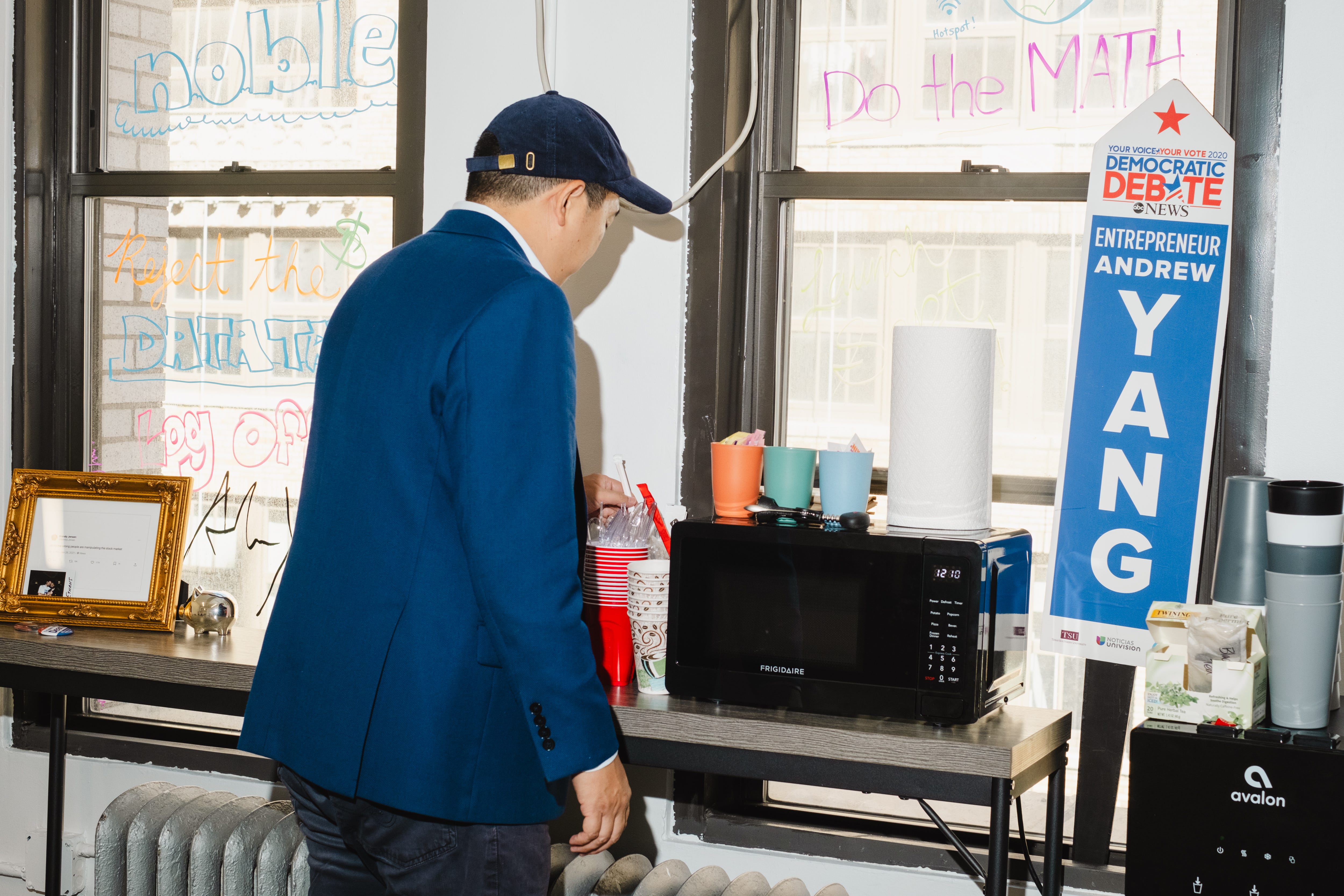 Andrew Yang is preparing coffee