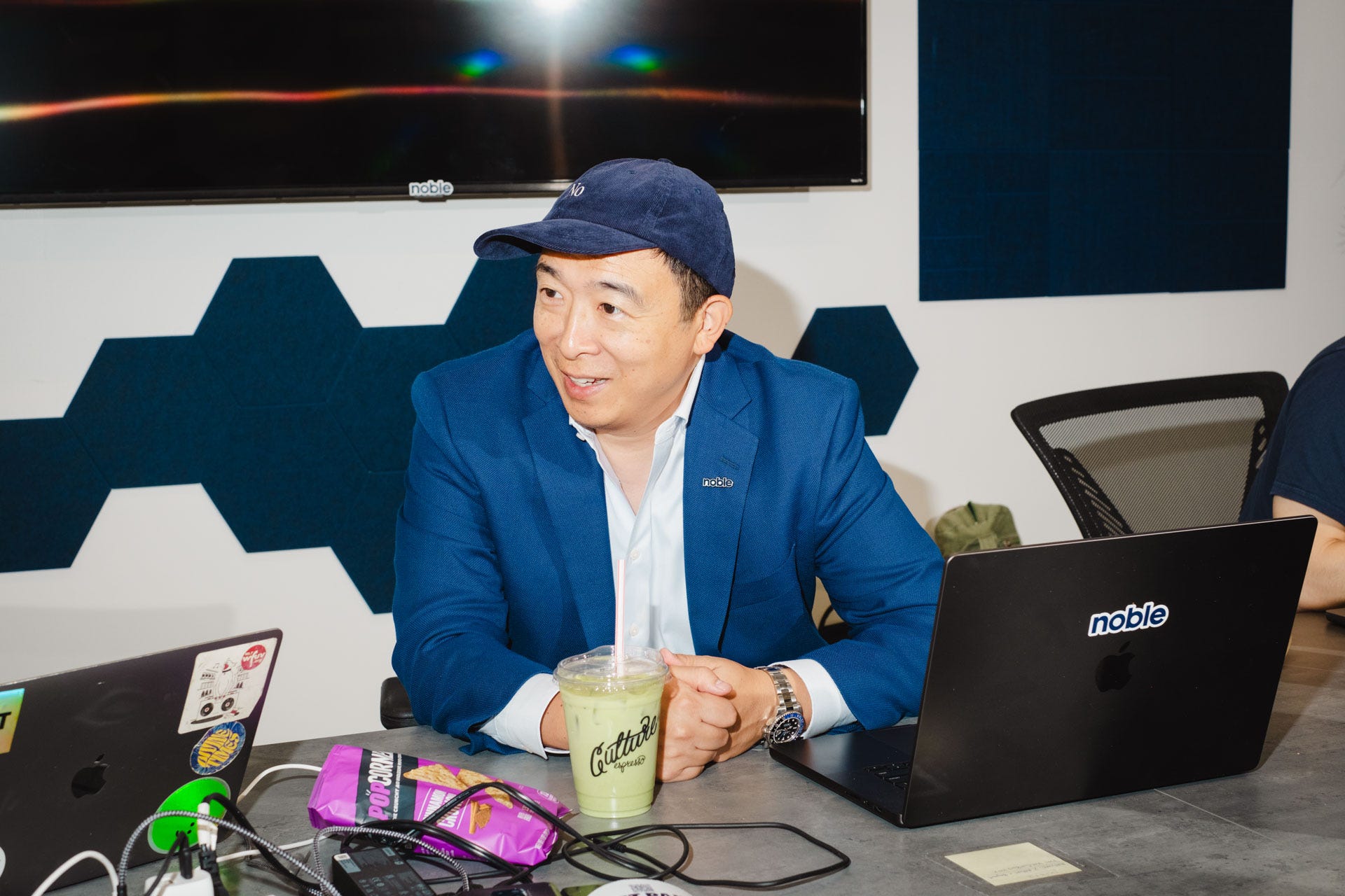Andrew Yang at his desk