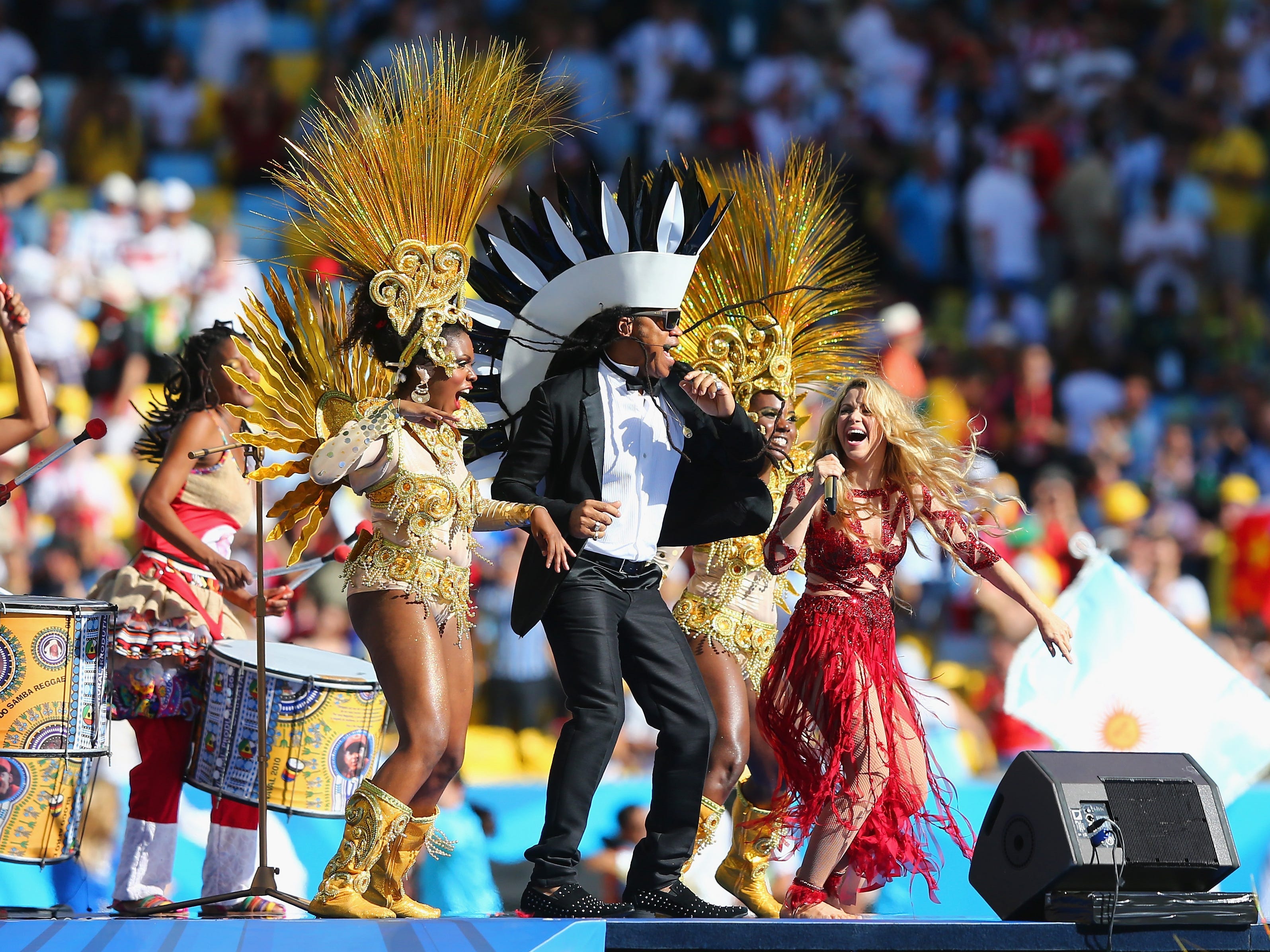 Musician Carlinhos Brown and singer Shakira perform during the closing ceremony prior to the 2014 FIFA World Cup Brazil Final match between Germany and Argentina at Maracana on July 13, 2014 in Rio de Janeiro, Brazil.