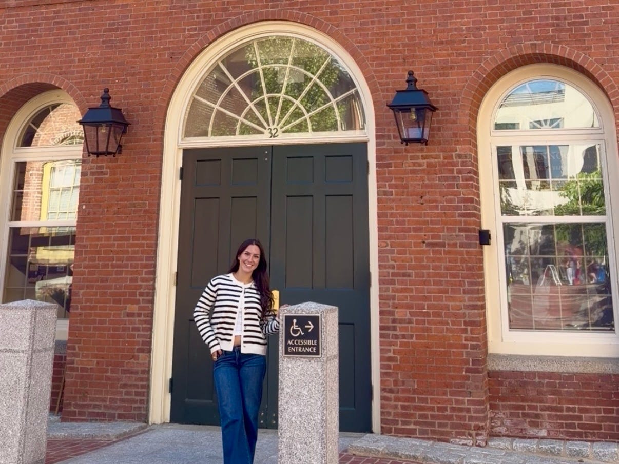 Amanda posing in front of the Old Town Hall in Salem.