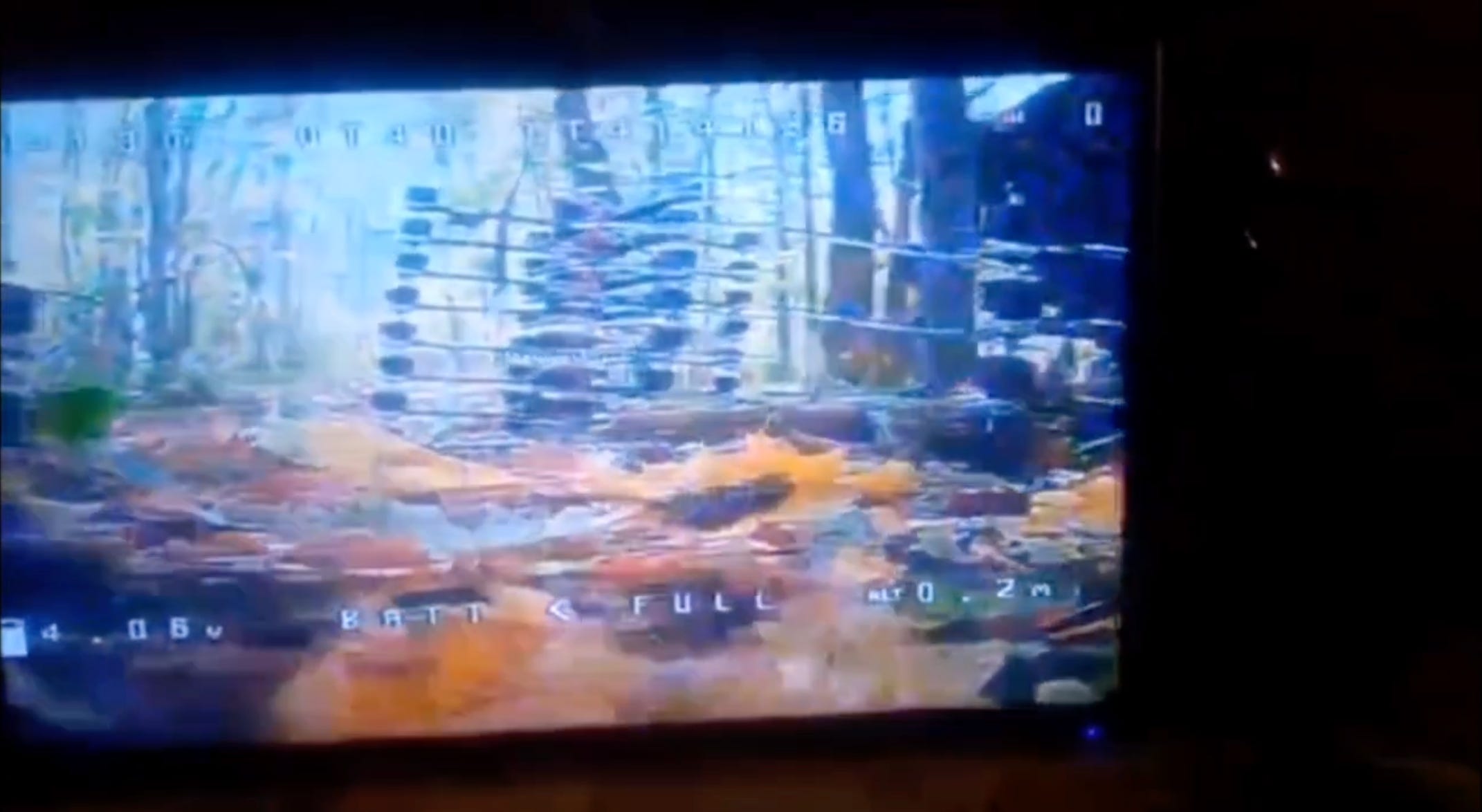 Footage of a stack of drones next to a North Korean soldier.