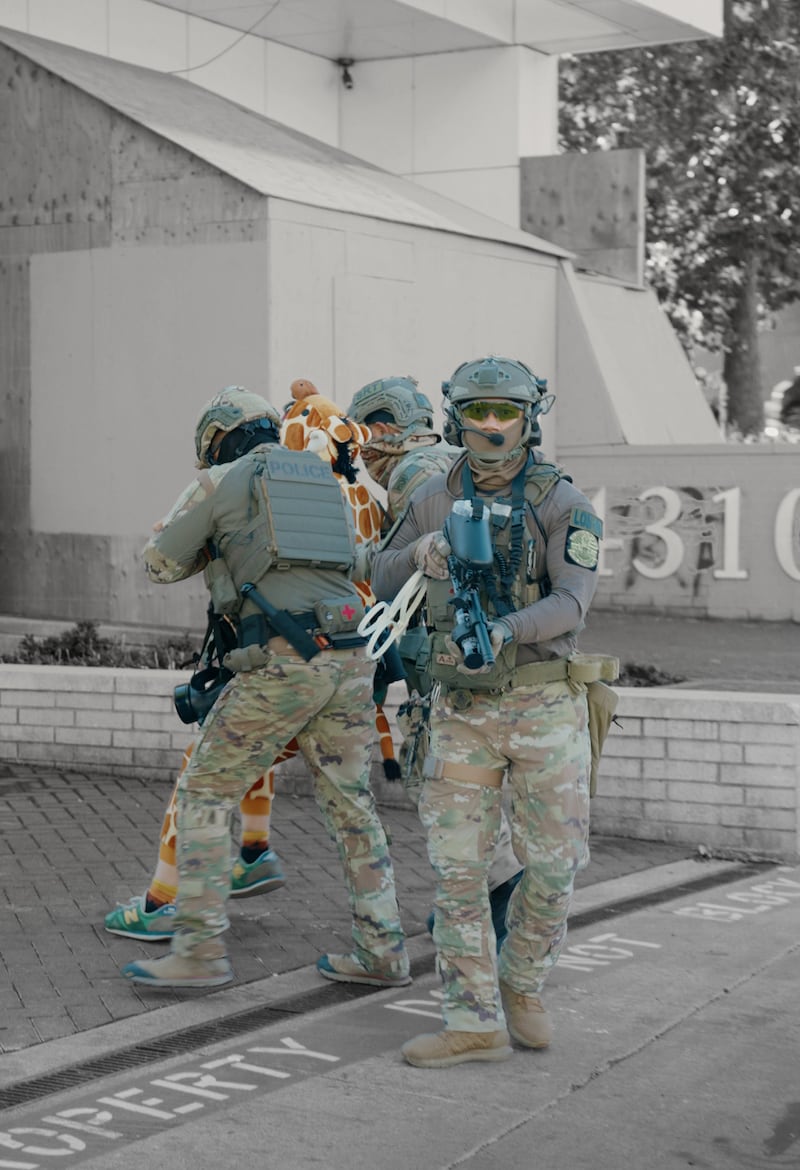 Robby Roadsteamer was arrested and led into the Portland ICE facility by armed and masked officers after he was shot by their colleagues.