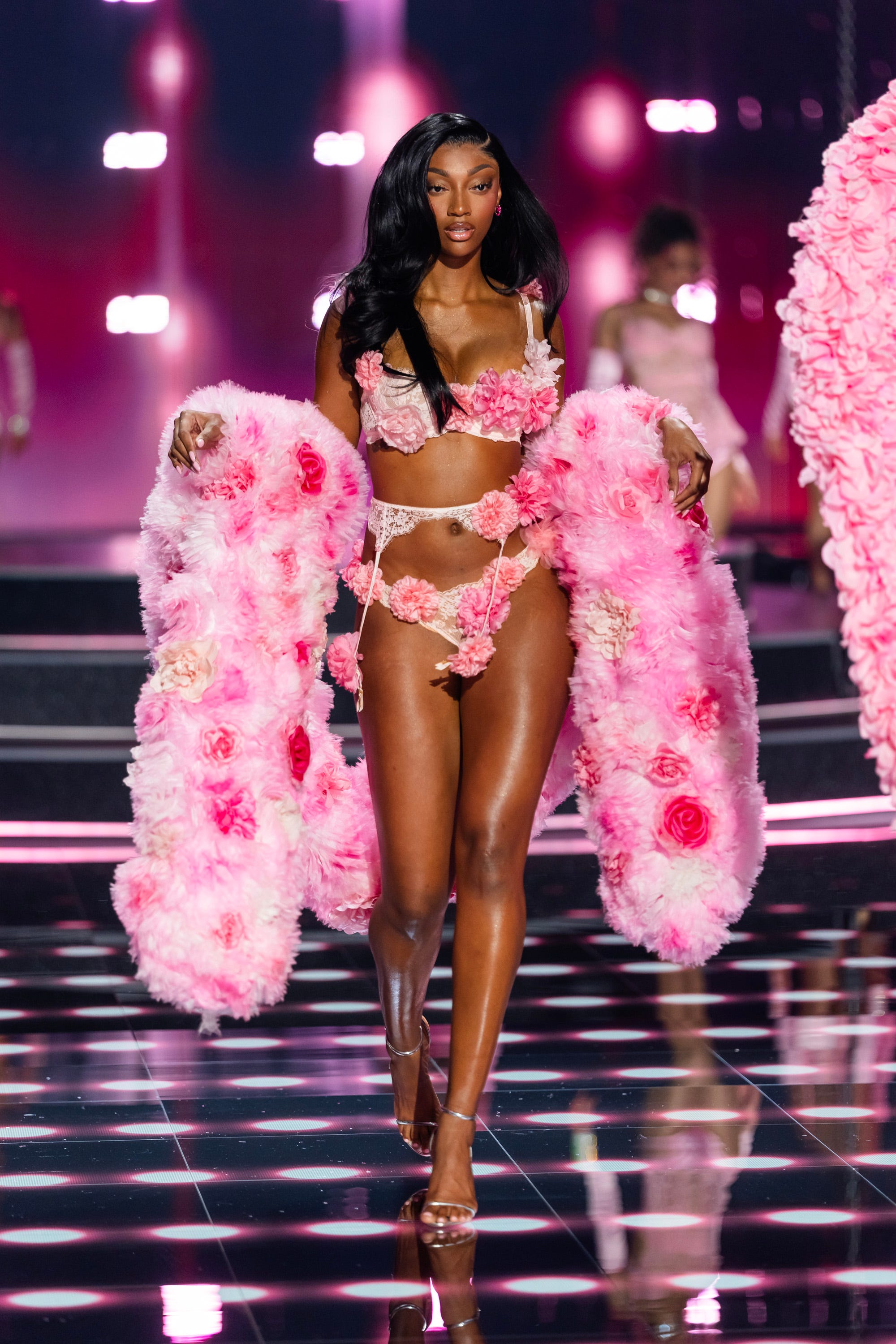 Angel Reese walks the Victoria's Fashion Show runway in New York City.