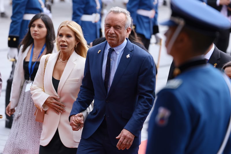 U.S. Health and Human Services Secretary Robert F. Kennedy Jr. (R) and his wife Cheryl Hines