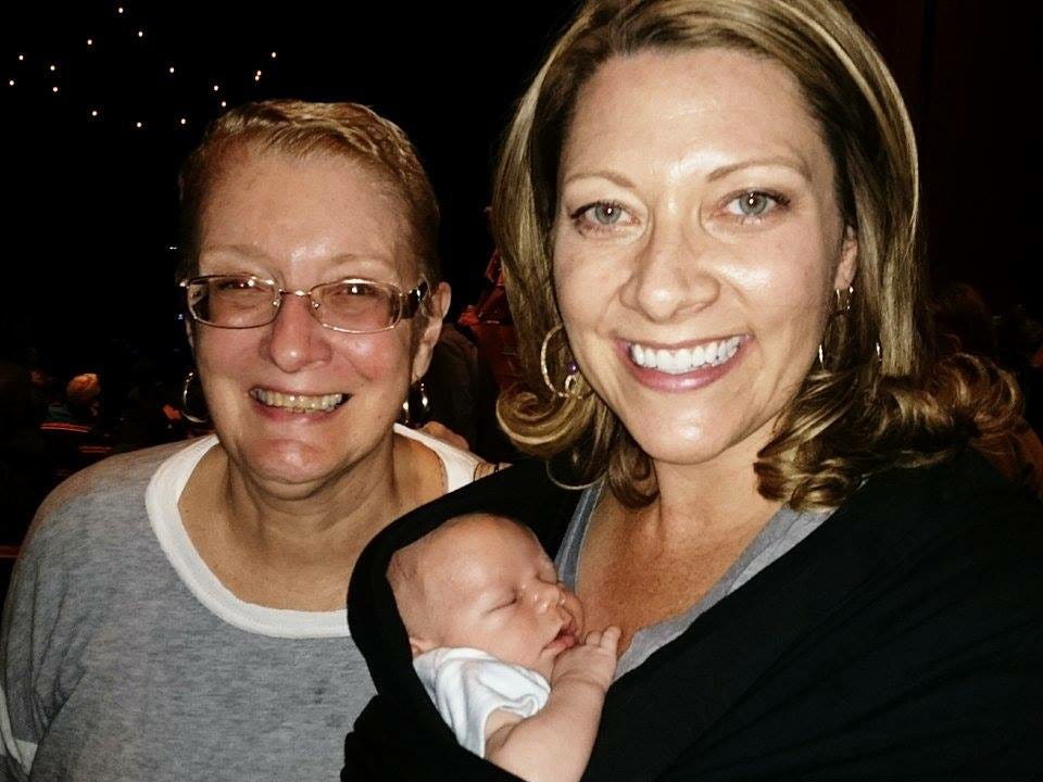 A grandmother, her daughter, and her baby grandson