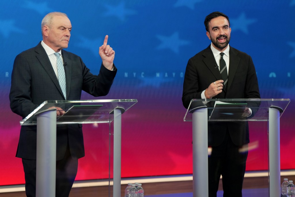 Republican candidate Curtis Sliwa, left, and Democratic candidate Zohran Mamdani participate in a mayoral debate, Thursday, Oct. 16, 2025, in New York. 