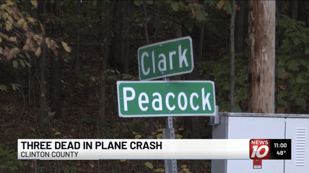 Street signs for Clark Road and Peacock Road.