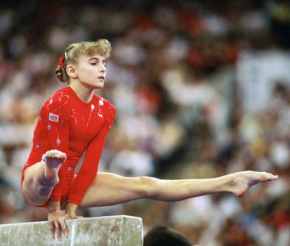 Gymnast Shannon Miller competing on the balance beam