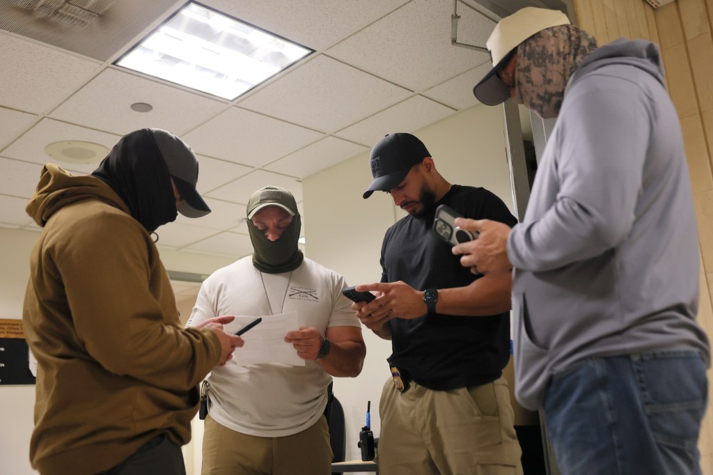 Federal agents patrol the halls of immigration court at the Jacob K. Javitz Federal Building on October 16, 2025 in New York City. 