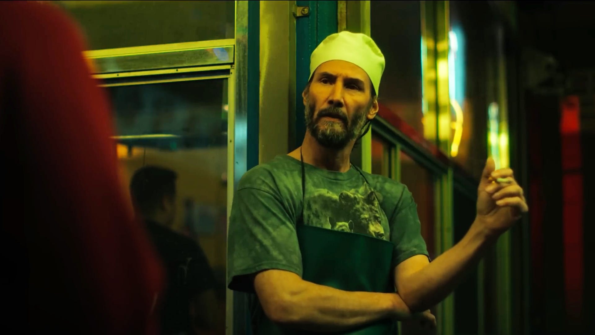 Keanu Reeves smoking a cigarette in the movie Good Fortune