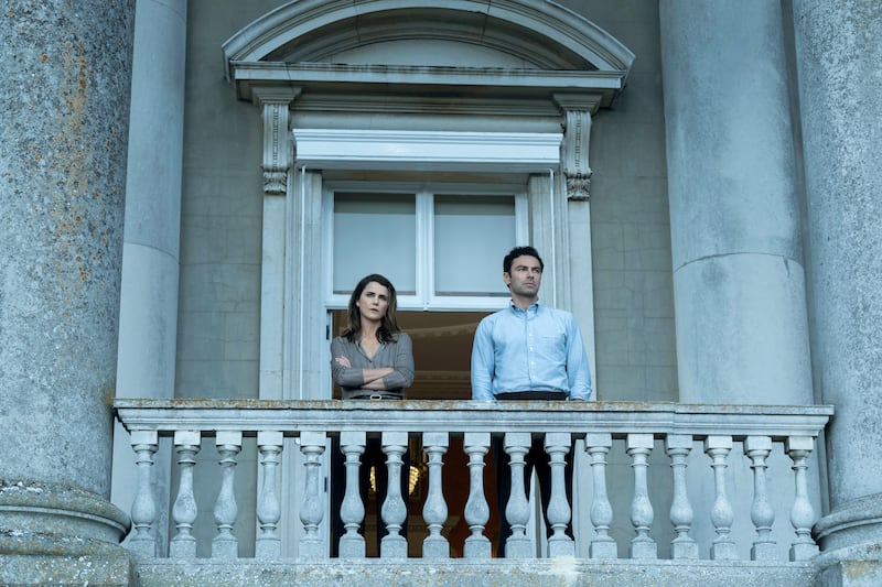 Keri Russell as Kate Wyler and Aidan Turner as Callum Ellis.
