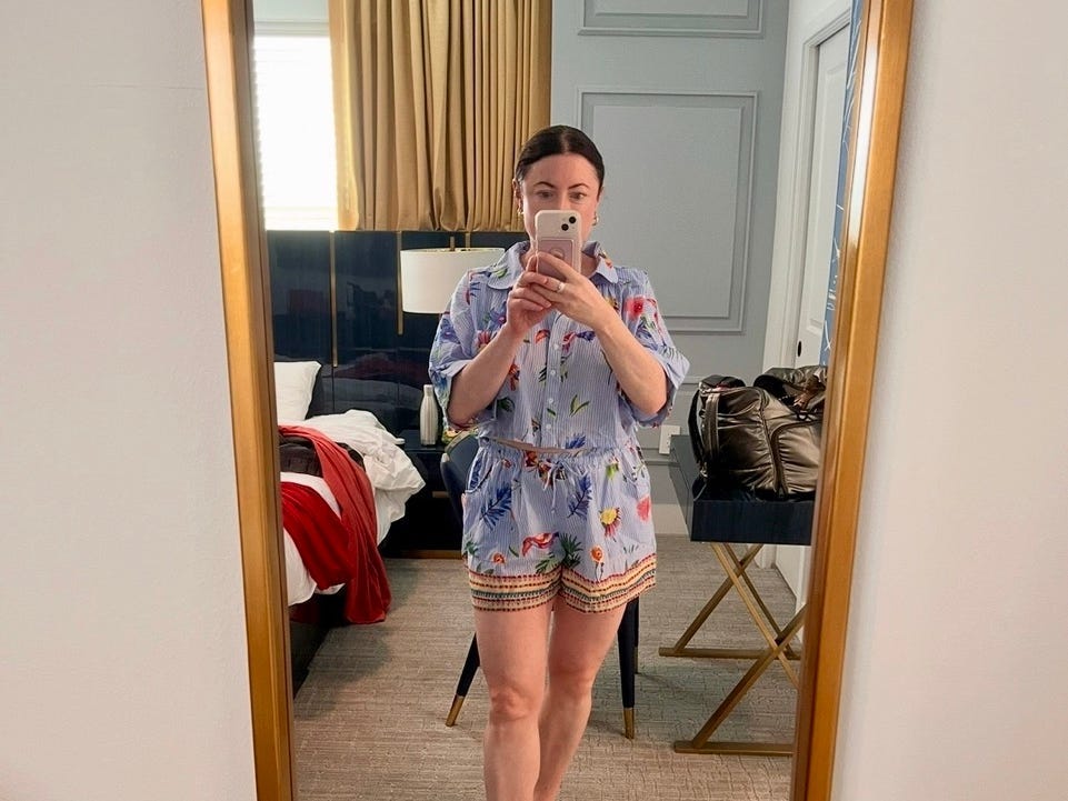 Person taking selfie in mirror