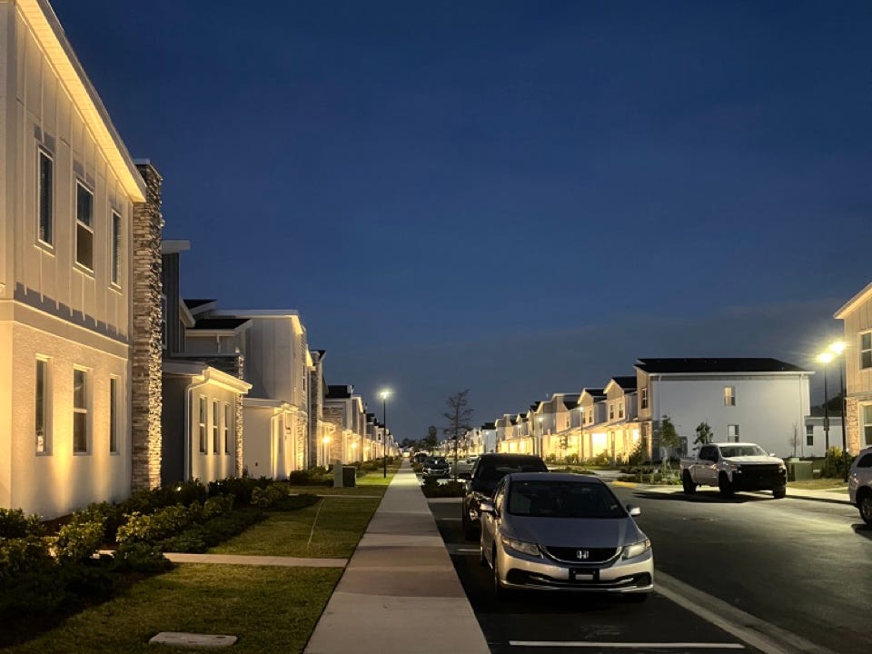 Row of villas at Orlando Villatel at night