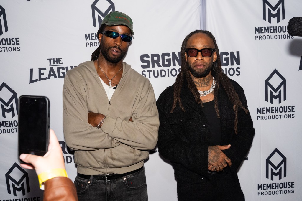 Commissioner Ron Abaekobe and Ty Dolla $ign pose together at The League.