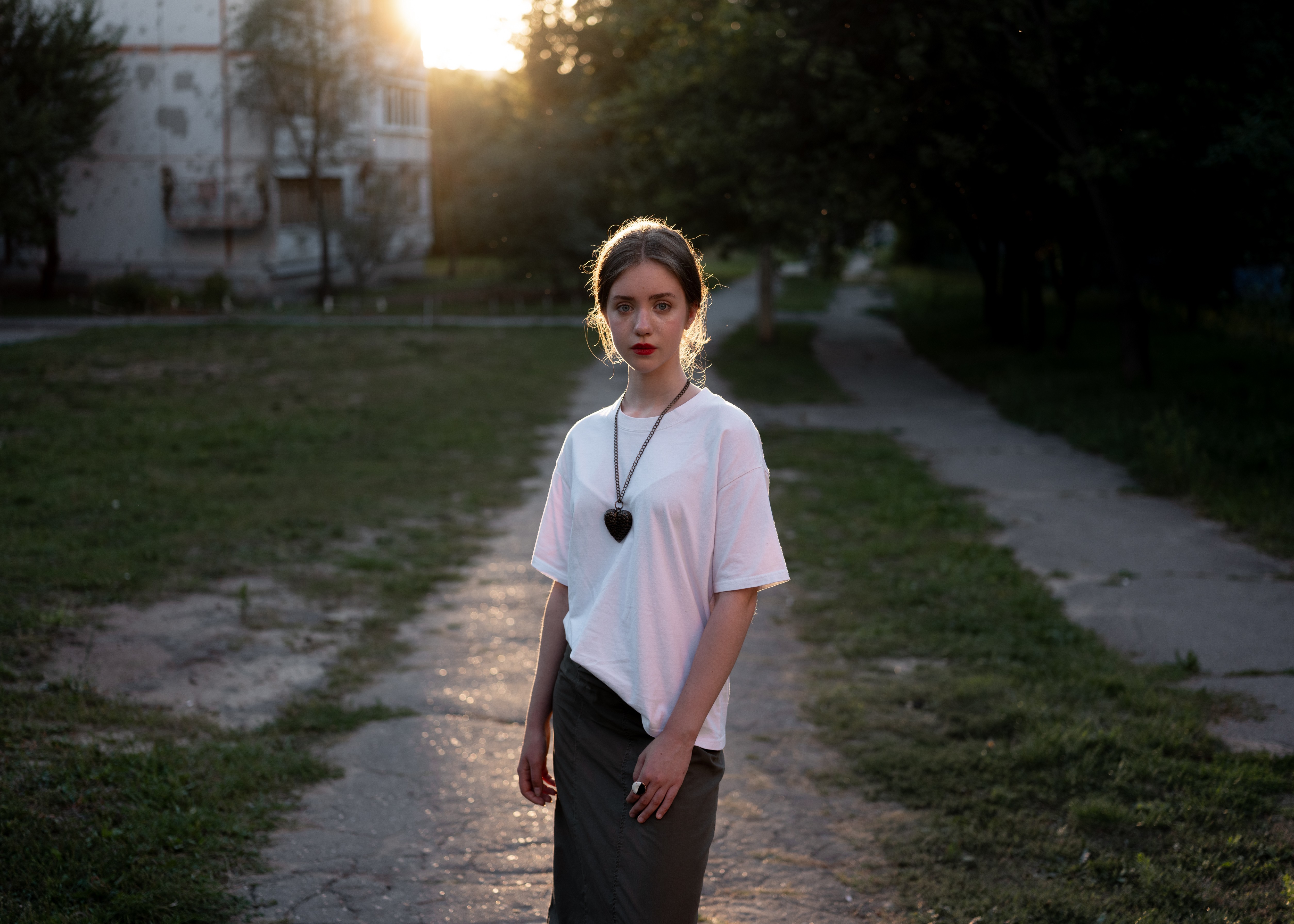 Picture of Anna Kovalenko posing for a portrait in the Saltivka district of Kharkiv where she lives.