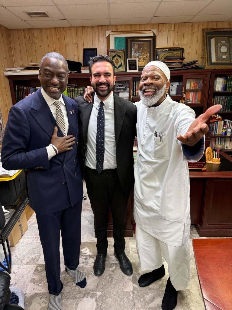 Zohran Mamdani, Imam Siraj Wahhaj, and a third man standing in a room.