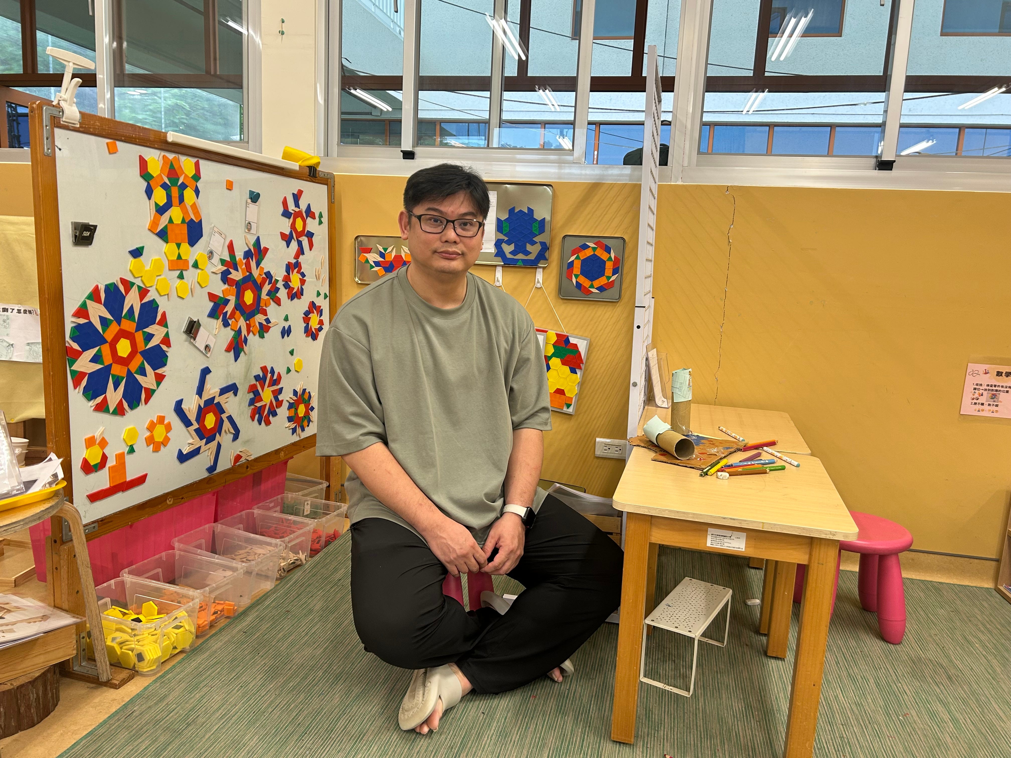 Chiang Chung-hwa, the principal of Gaofeng kindergarten in Hsinchu, Taiwan at his workplace.