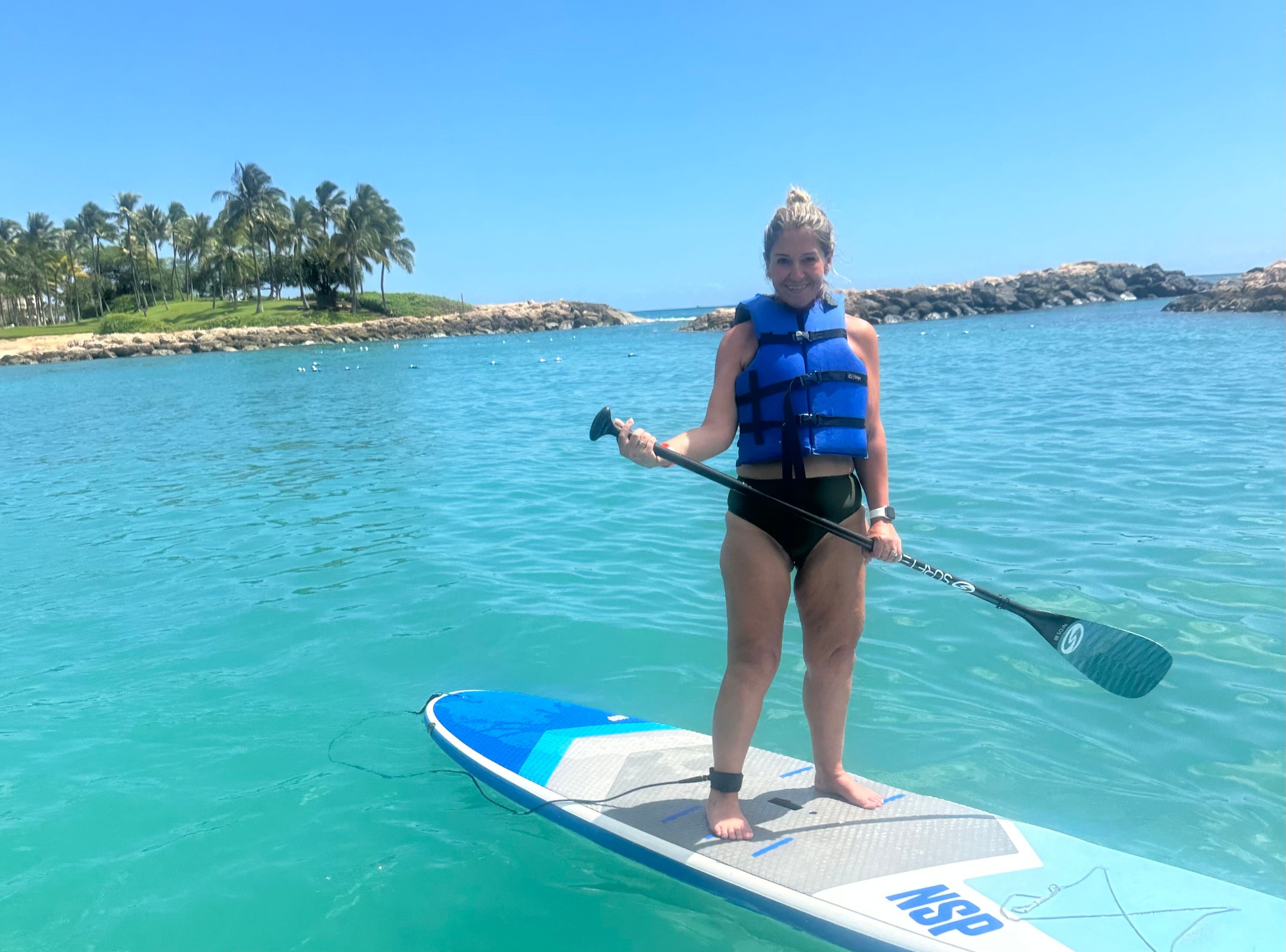 Terri Peters paddleboarding in Hawaii.