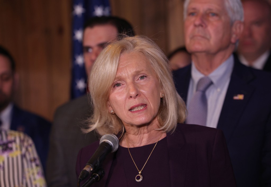 Nassau County Comptroller Elaine Phillips speaking at a press conference.