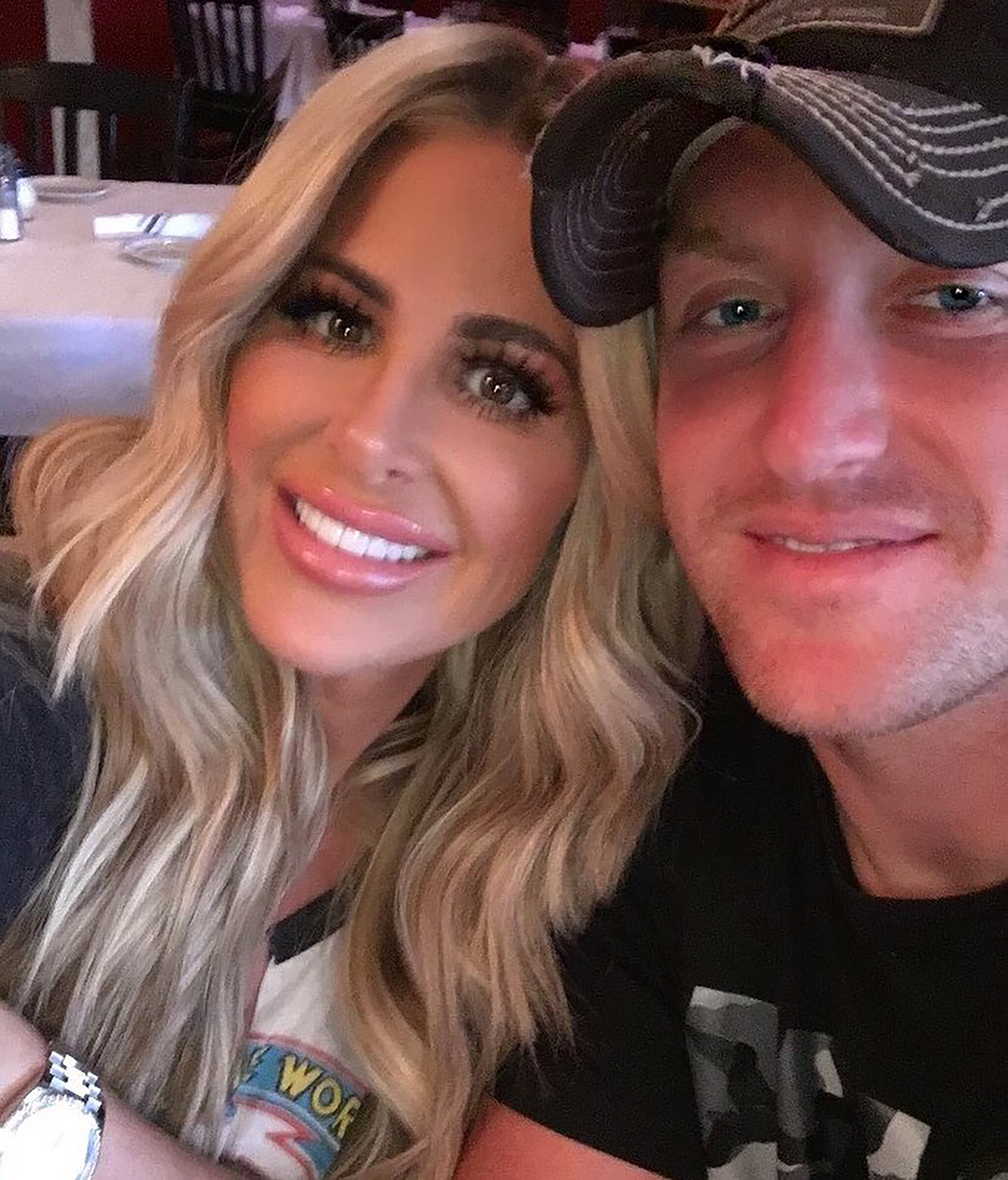 Kim Zolciak and Kroy Biermann smiling together.