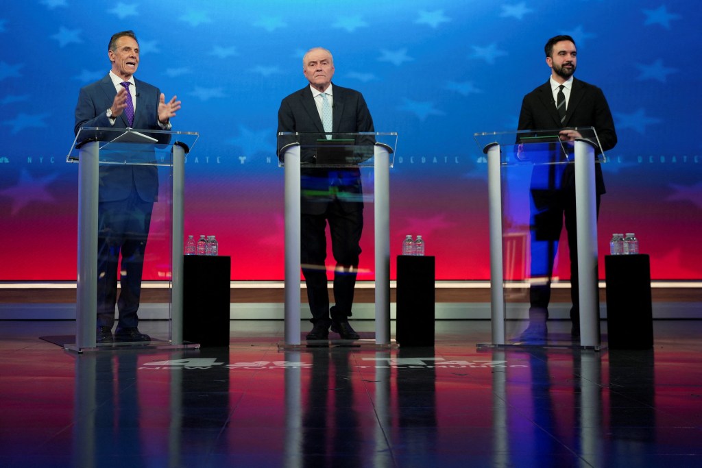 Three men, candidates for mayor, participate in a debate.