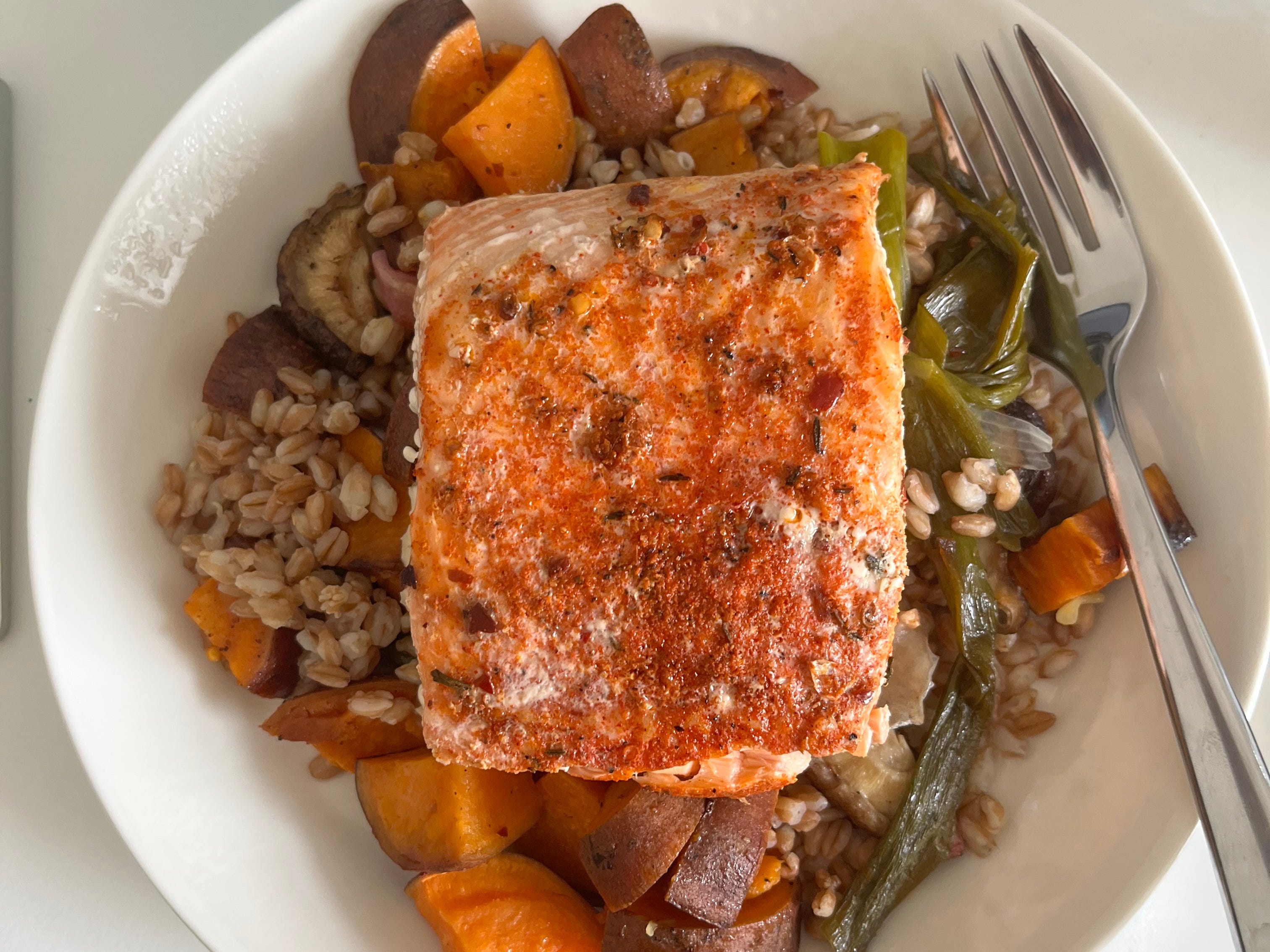 Salmon with vegetables and farro