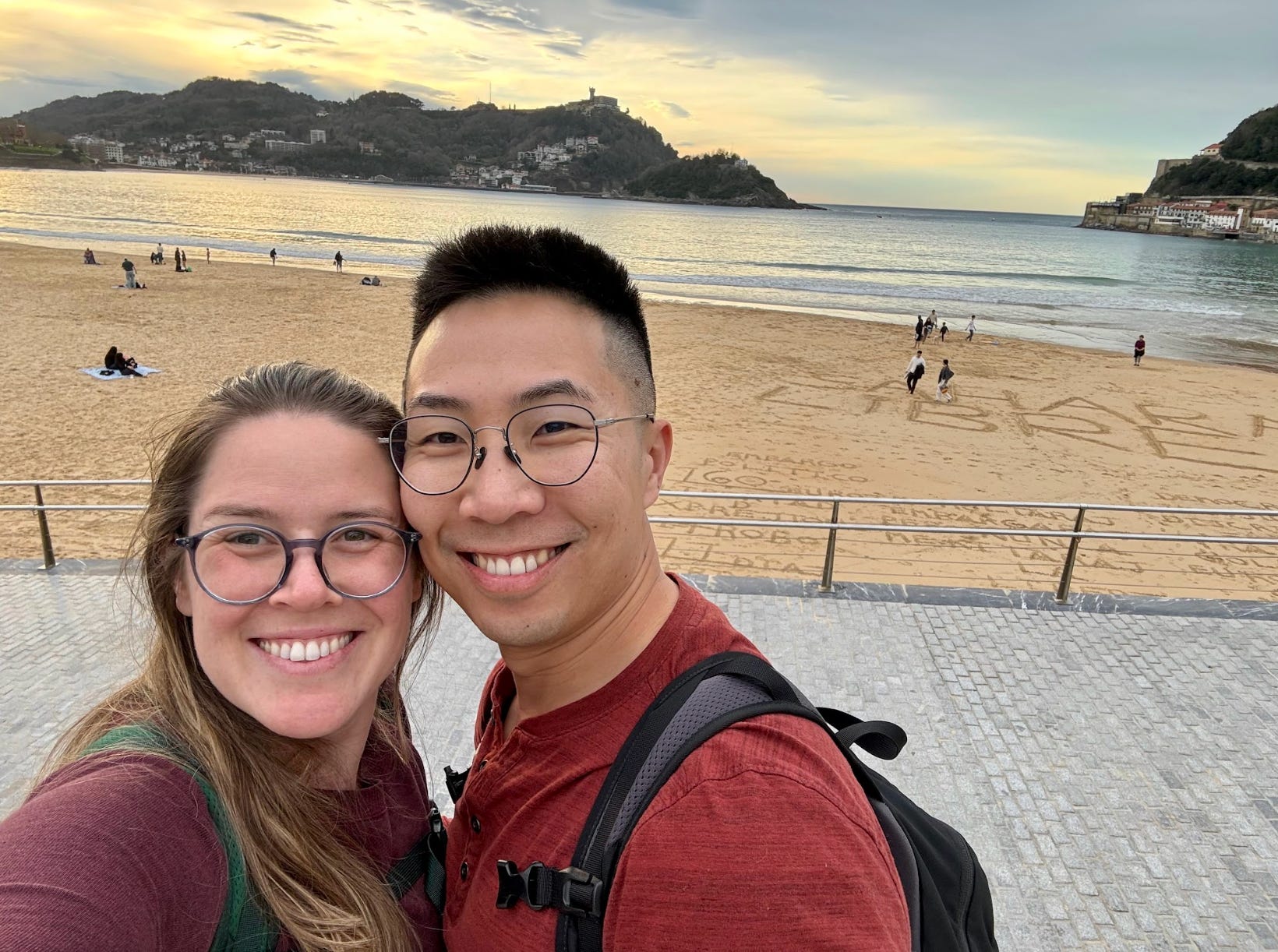 The writer and her husband on the beach in San Sebastian, Spain.
