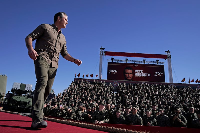 US Secretary of Defense Pete Hegseth walks on stage to deliver remarks as part of the Marine Corps' 250th anniversary celebration at Camp Pendleton, California, on October 18, 2025. (Photo by Oliver Contreras / AFP) (Photo by OLIVER CONTRERAS/AFP via Getty Images)