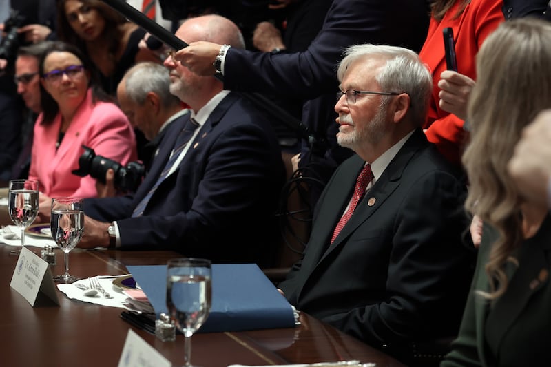 Australian Ambassador to the U.S. Kevin Rudd was sitting opposite Trump when he was called out for past comments about the president.