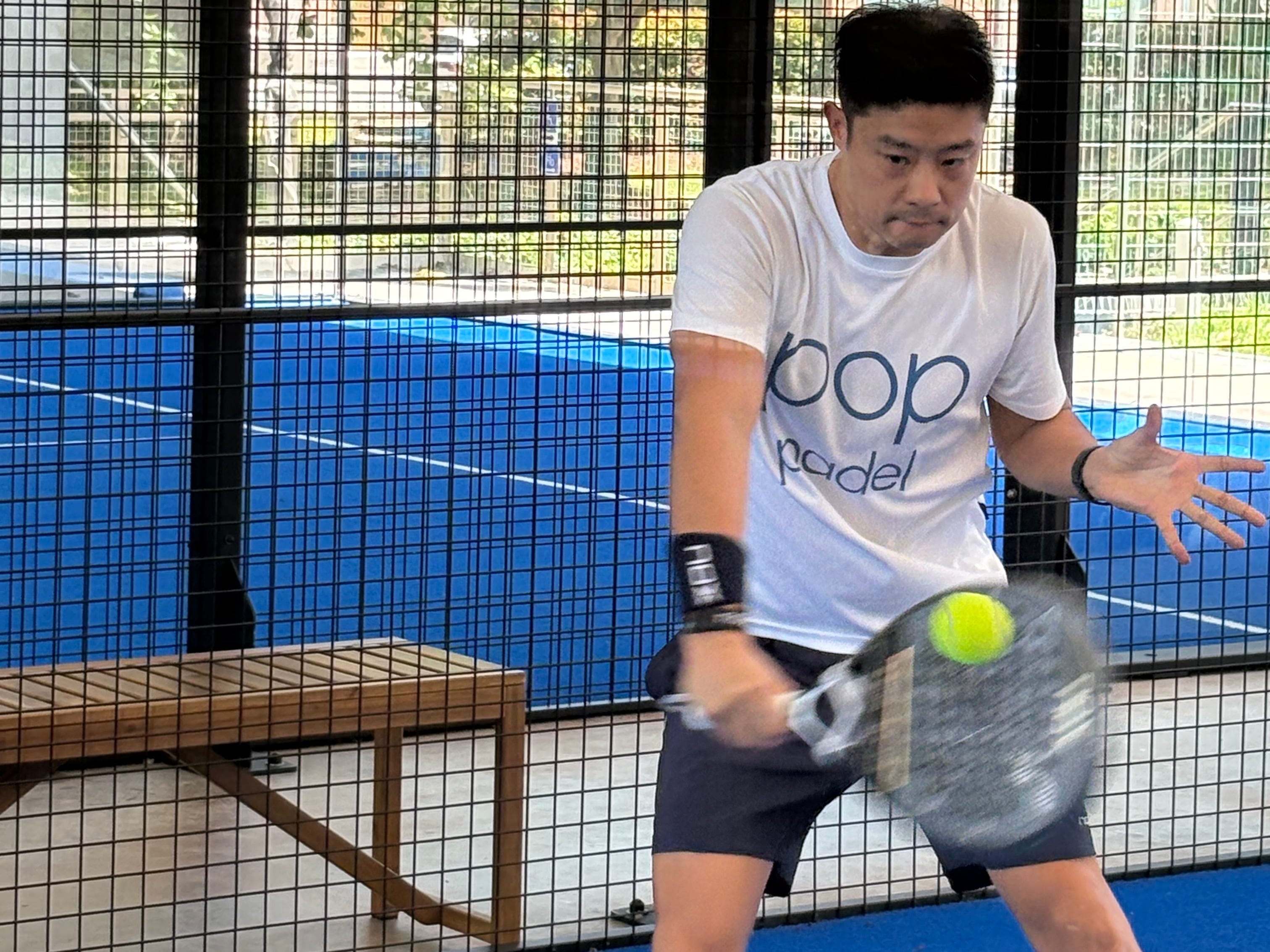 Davy Sanh playing a game of padel