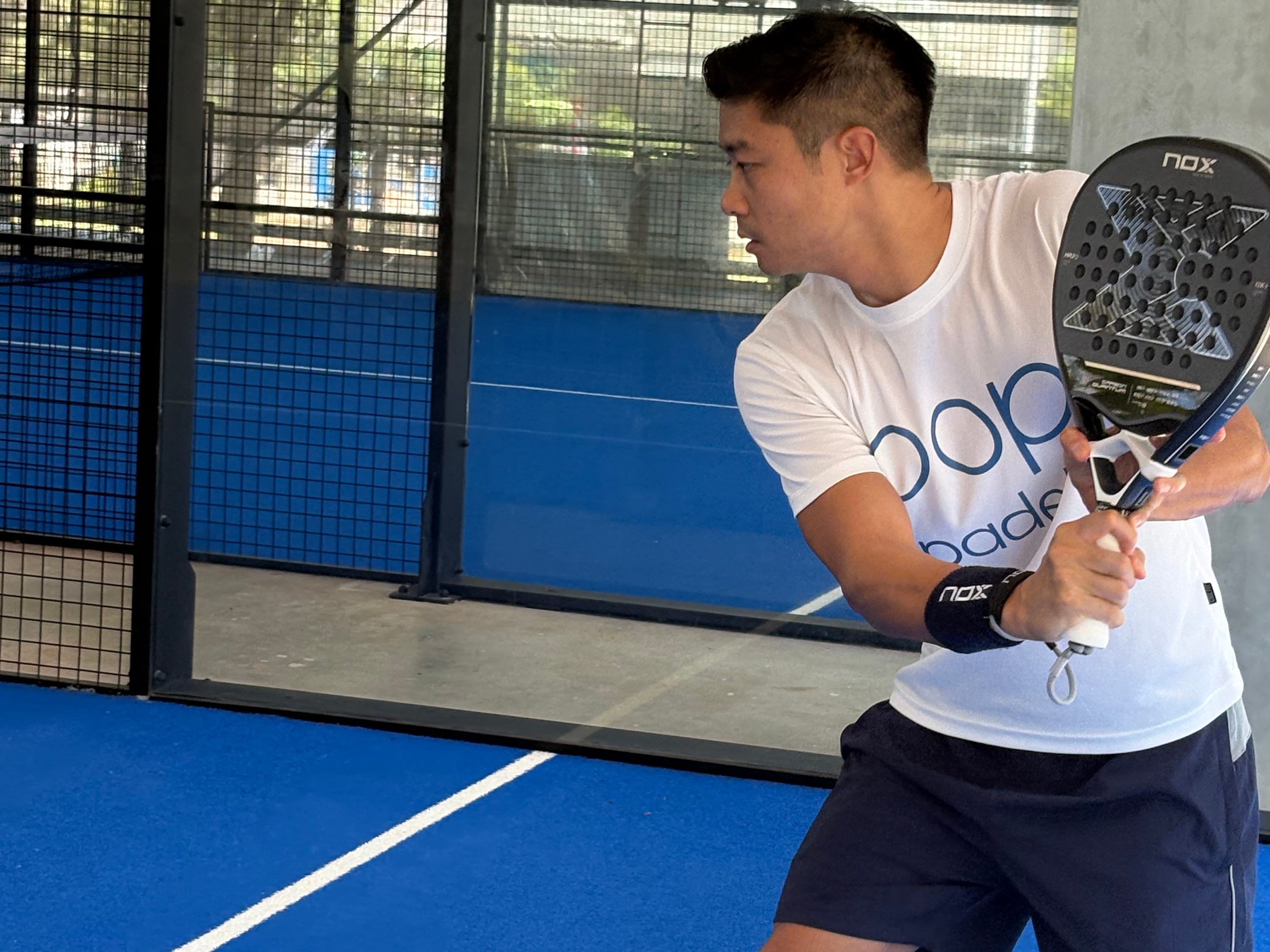Davy Sanh is playing a game of padel