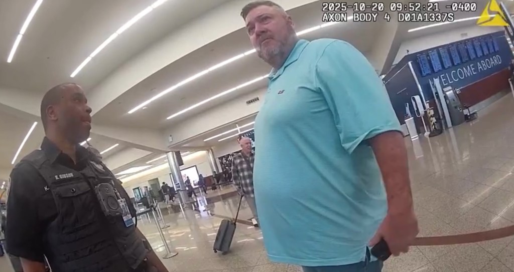 Police bodycam footage of Billy Cagle in an airport.