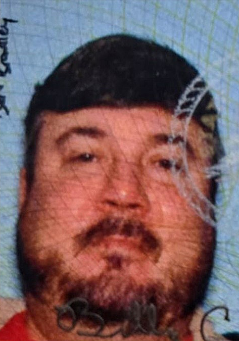 Billy Cagle's photo on an ID card.