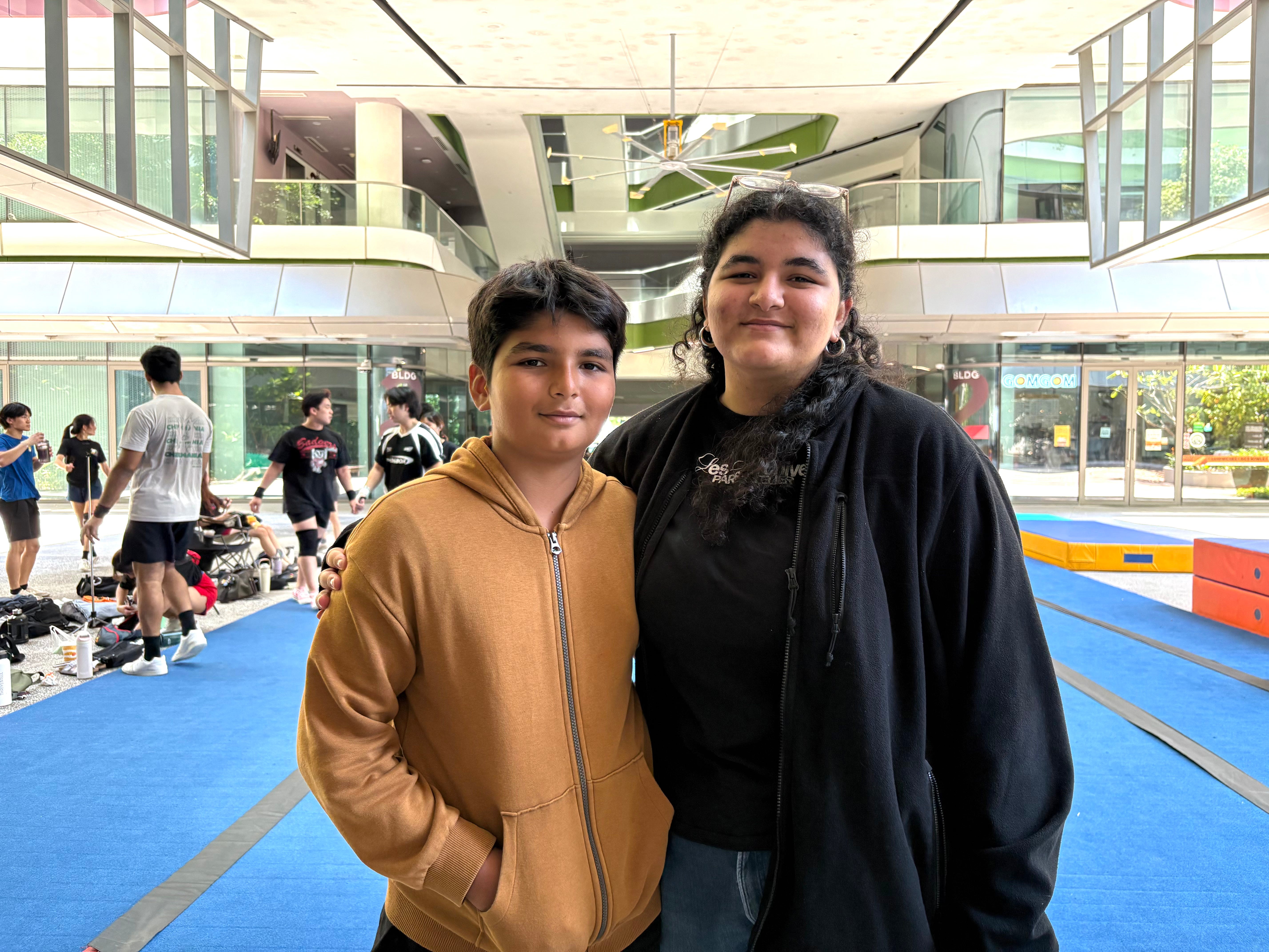 Usman Asif (L) and Shanzey Asif (R) attended the hackathon with their father.