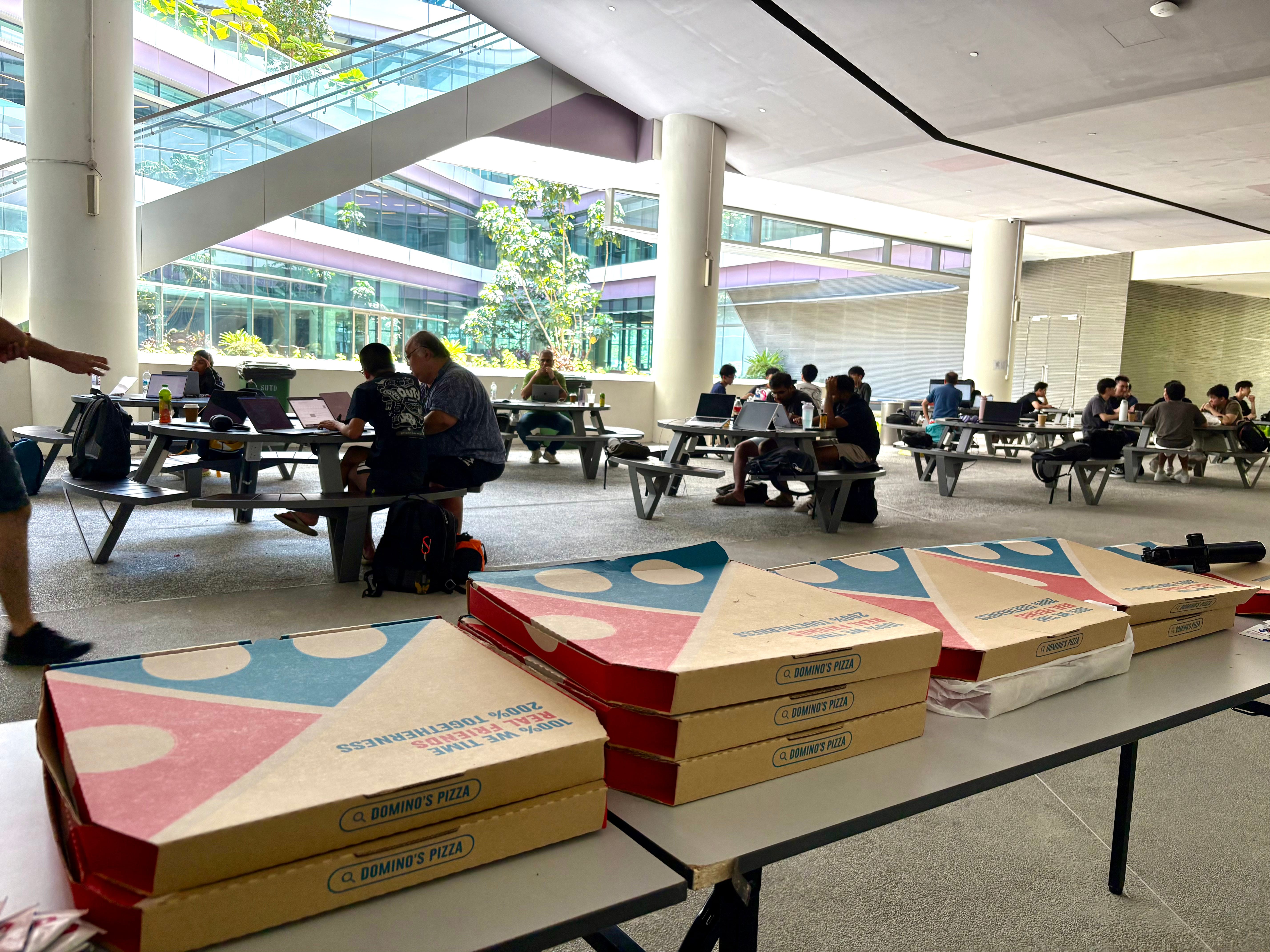 Dominos pizza boxes stacked up