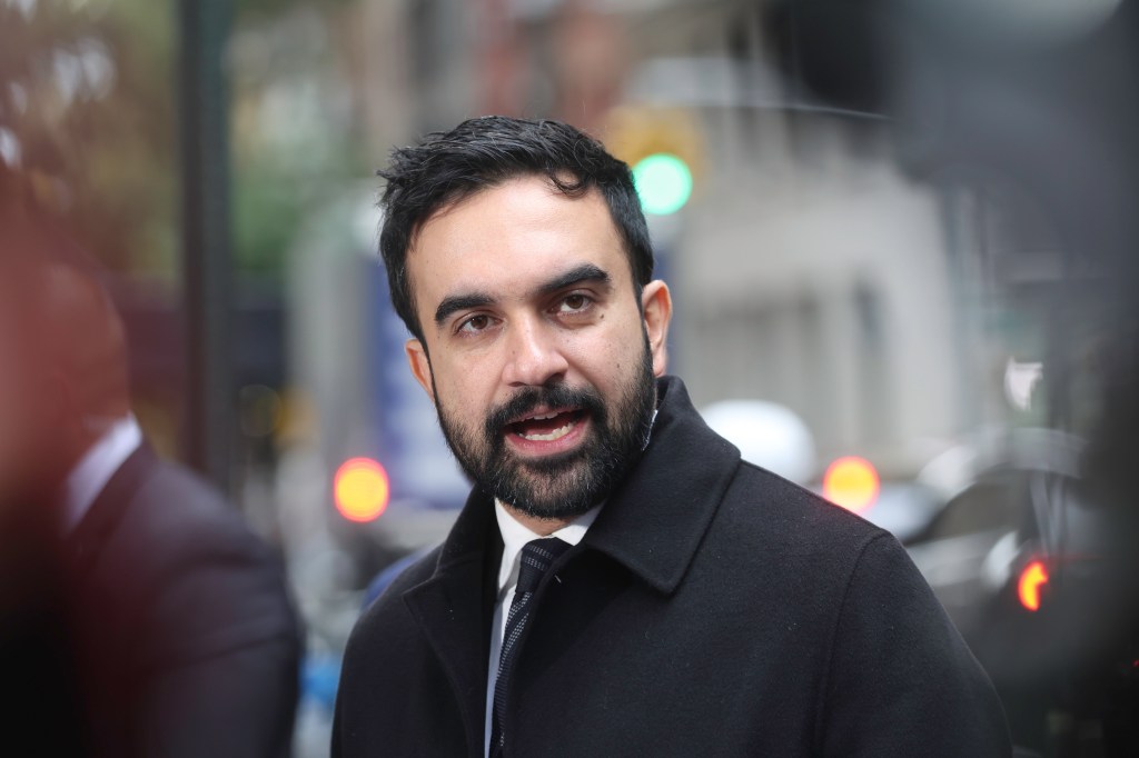 Zohran Mamdani speaking at a press conference about scaffolding in NYC.