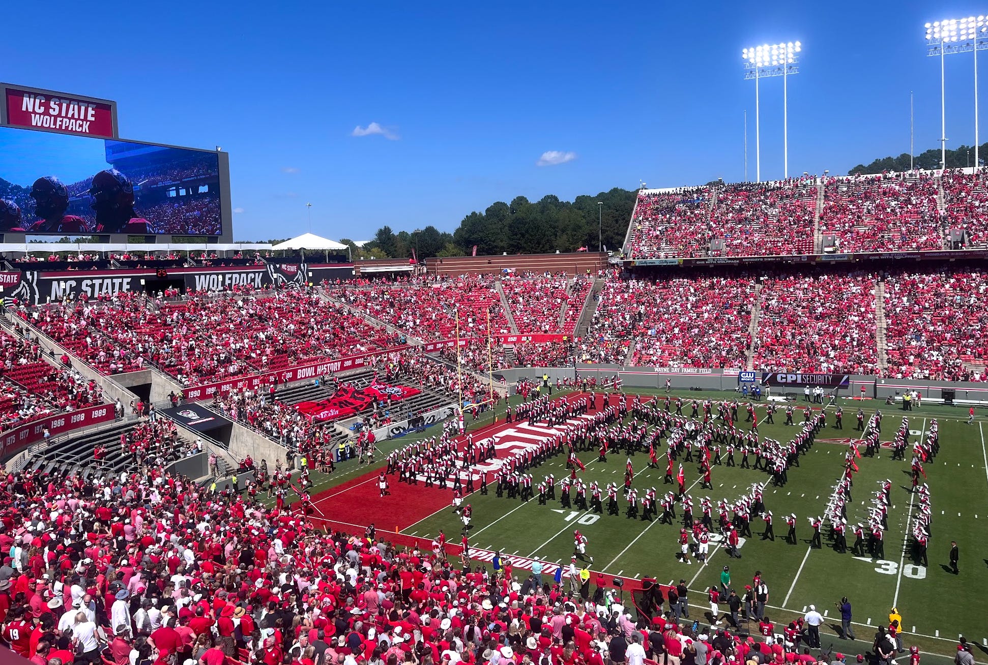 The writer at an NC State game.