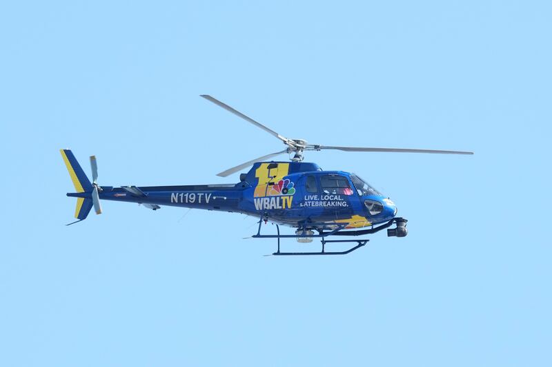 BALTIMORE, MD - JULY 11:  WBAL 11 New helicopter flies over the stadium before a baseball game between the Baltimore Orioles and the Miami Marlins at Oriole Park at Camden Yards on July 11, 2025 in Baltimore, Maryland. (Photo by Mitchell Layton/Getty Images)